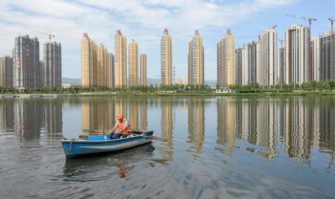 Por que cidades fantasmas estão sendo construídas na China?